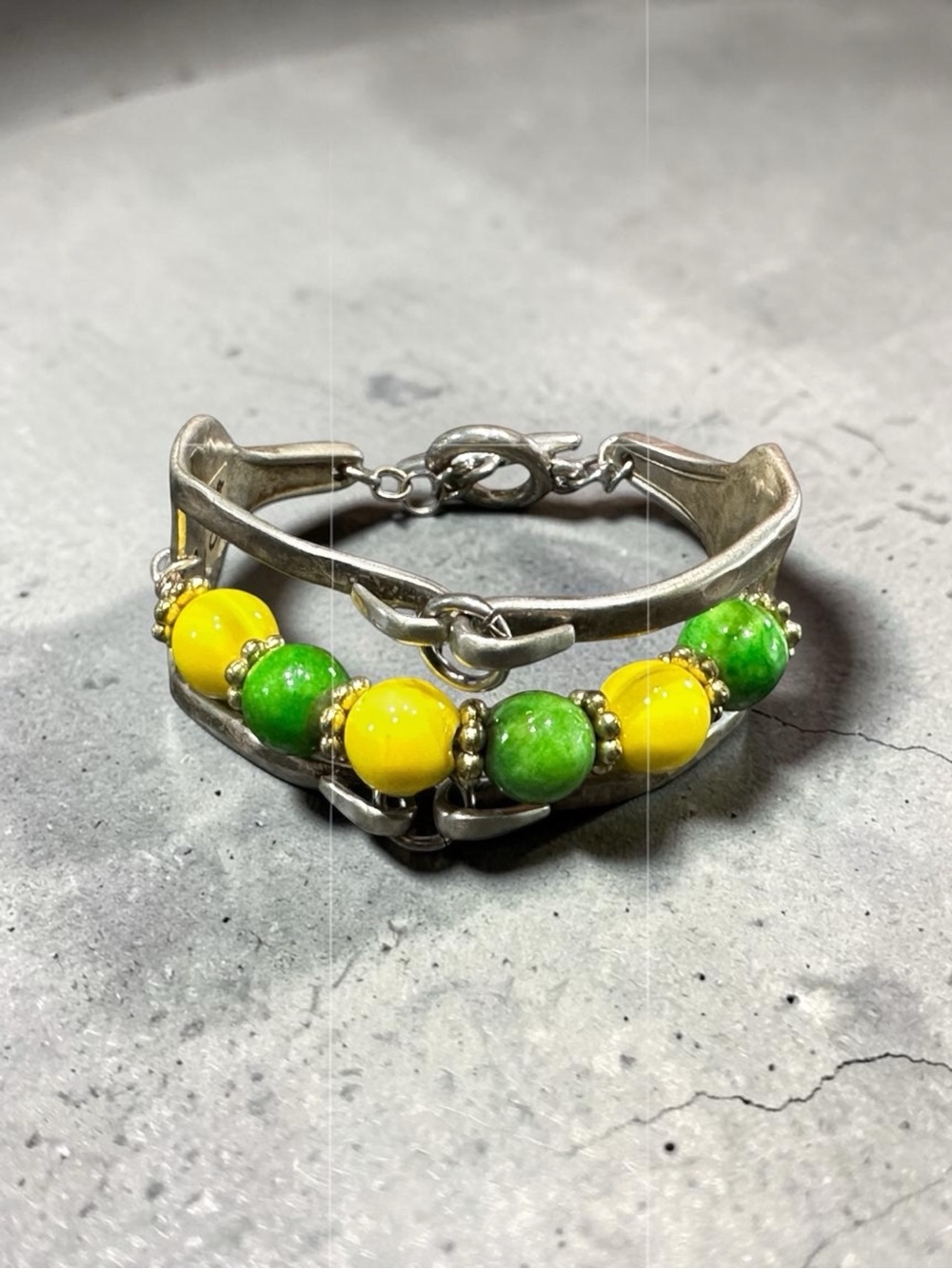 Women’s bracelet green and yellow Santeria beads sterling silver hardware toggle
